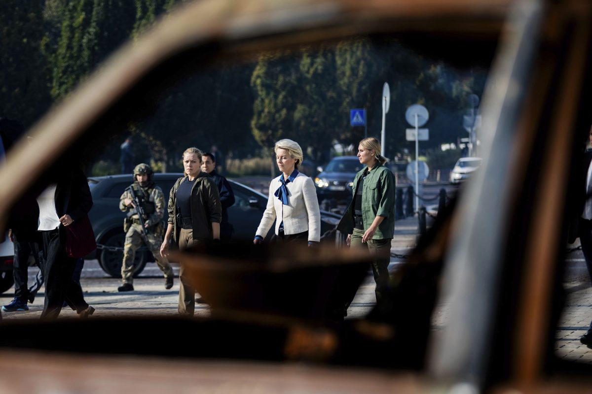 President of the European Commission Ursula von der Leyen, center, on her way to visit a memorial wall commemorating fallen Ukrainian soldiers in the war with Russia, in Kyiv, on September 20.