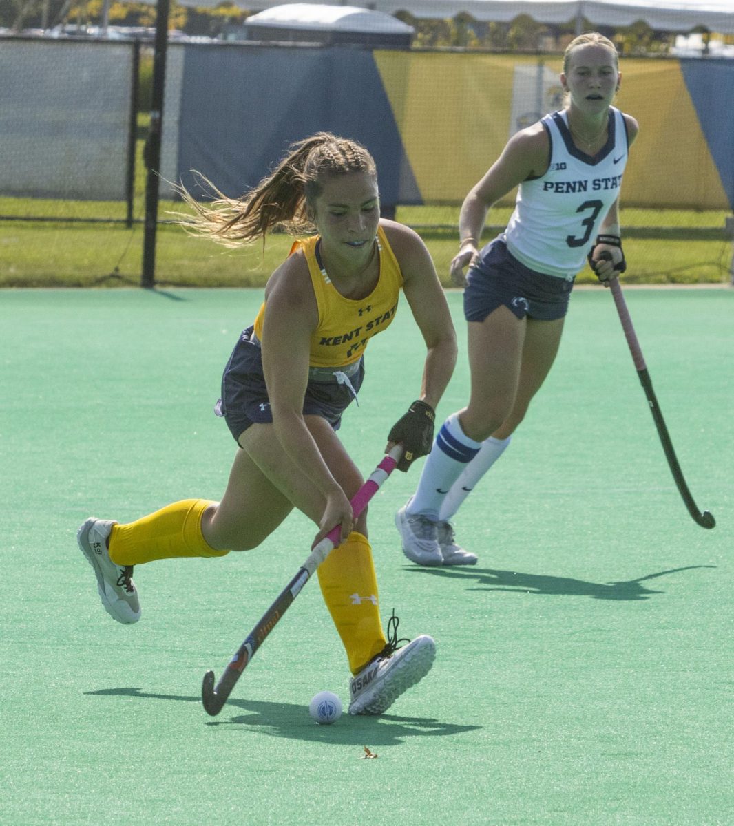 Sept. 13, 2024, junior midfielder Maia Sarrabayrouse (14) advances further down the pitch away from Penn State’s 5th year senior forward Sophia Gladieux (3) at the field hockey game.