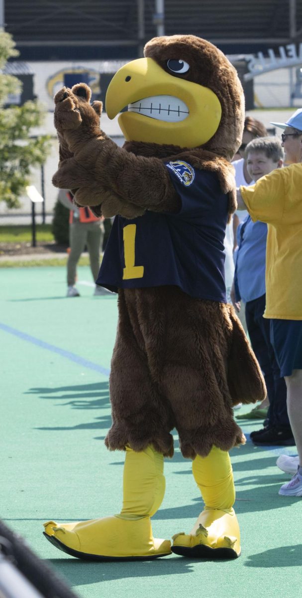 Flash the Golden Eagle interacts with the crowd during the alumni recognition celebration at the 50th anniversary game, against Penn State, Sept. 13, 2024.