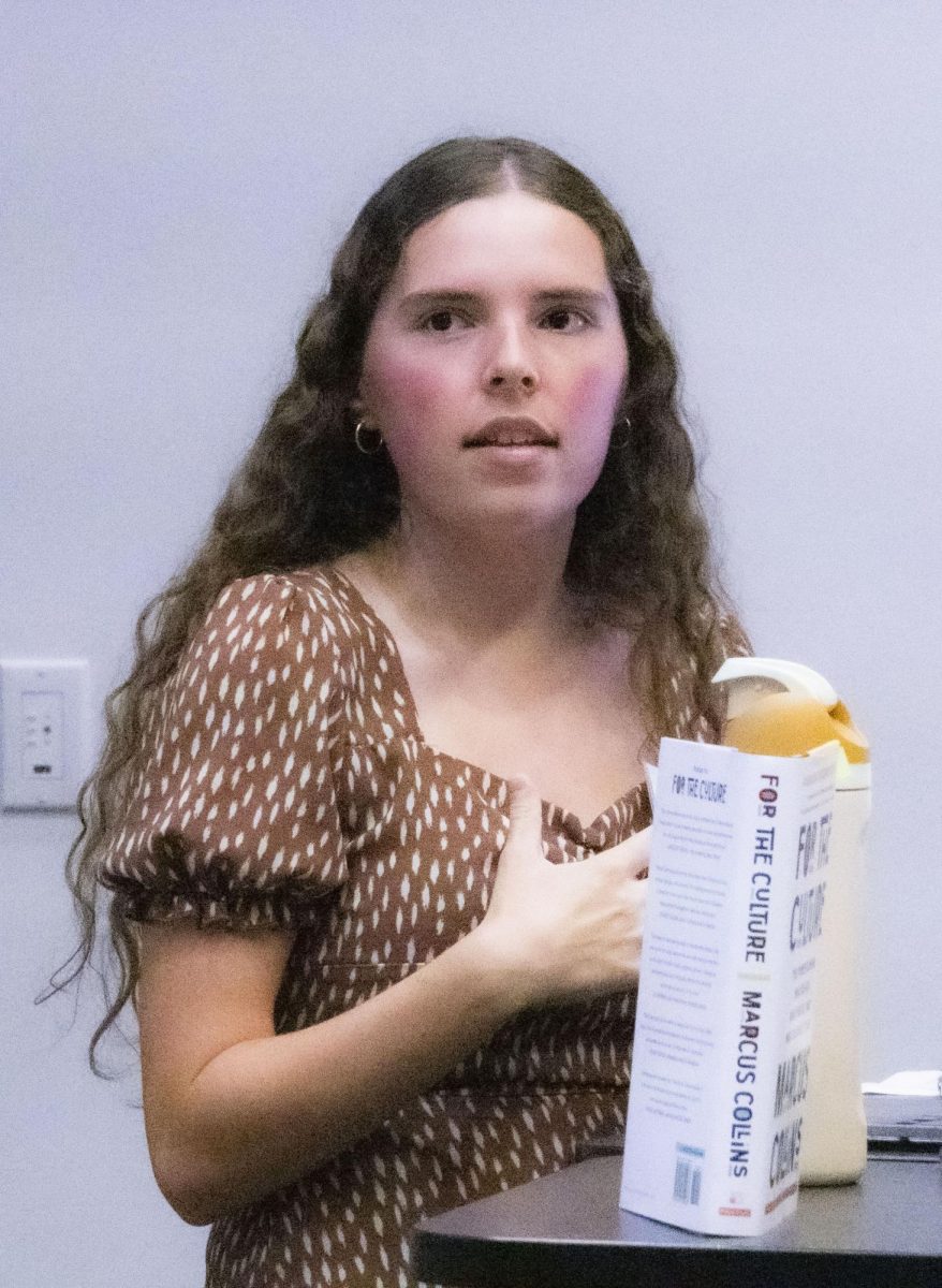 Kent AAF membership chair senior Shannon Russell asks Dr. Hannah Wing a question at the PRSSA Kent and Kent AAF Icons and Influencers event, Sept. 18, 2024.