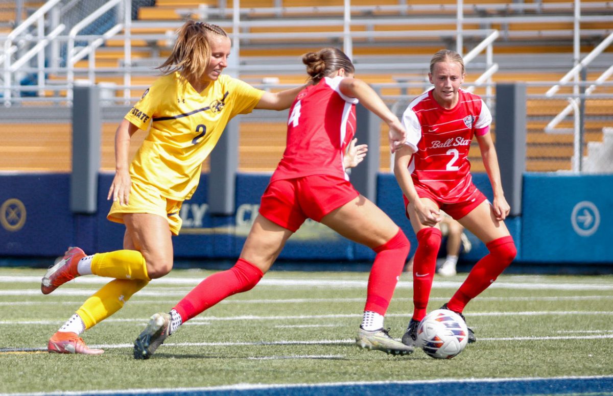 Kent sophomore midfielder Samantha Miller attempts to steal the ball from Ball State junior defender Acadia Murphy in the match on Sept. 22, 2024.