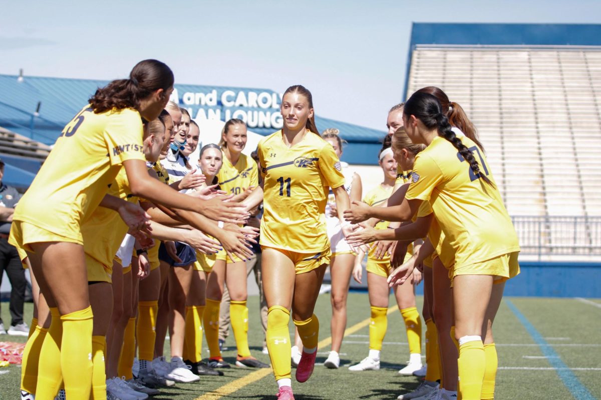 Kent State University, Senior, Midfielder, Alisa Arthur running through the group during the introduction in their match against Ball State University on September 22,2024.