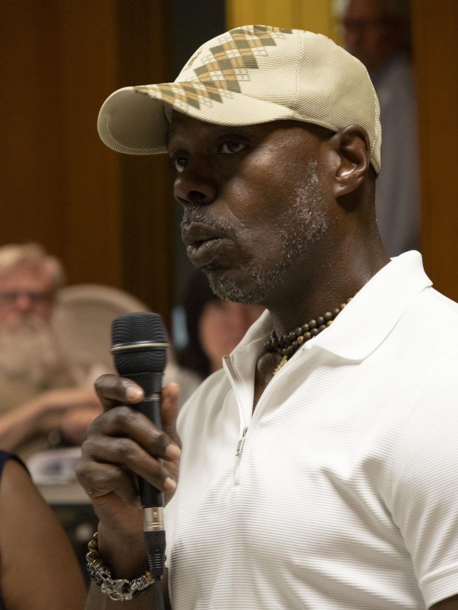 A member of the audience calls for sheriff Bruce Zuchowski’s removal from office at the Portage County NAACP emergency meeting, Sept. 19, 2024.