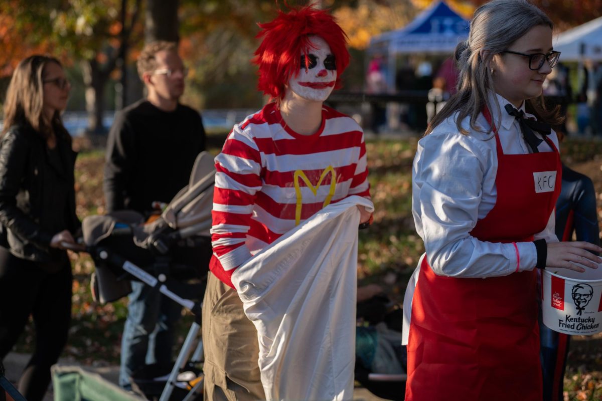 Ave and Amelia walk around at the Halloween party on Oct.  25, 2024.