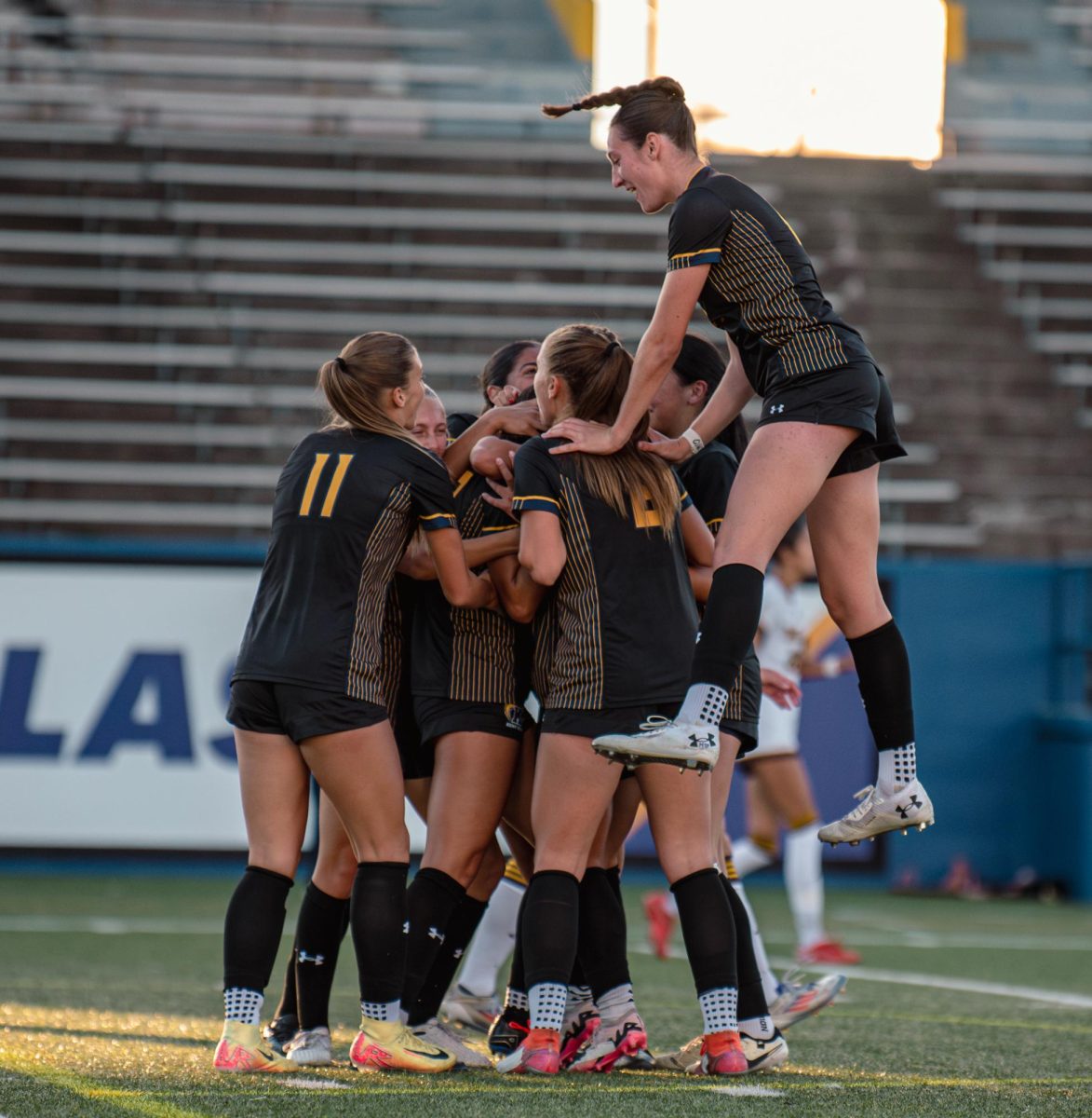 Kent State Soccer team celebrating the first goal made by Jules Dolinski, Kent State Freshman and Forward, against Western Michigan. Oct. 5, 2024.