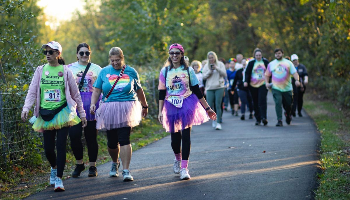 Drag Race attendees walk during the Drag Race 5k on Oct. 11, 2024.