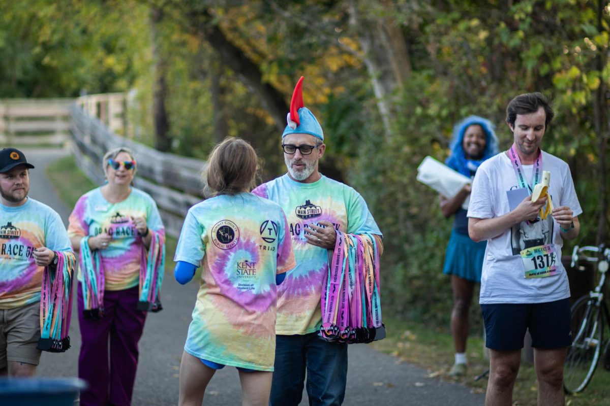 Medals are handed out at the end of the Drag Race 5k on Oct. 11, 2024.