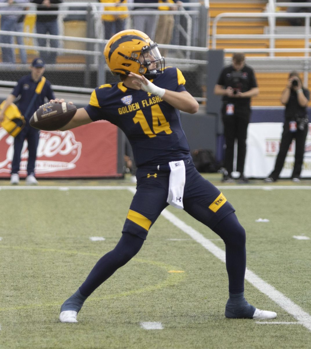 Freshman quarterback Tommy Ulatowski (14) aims his throw at the football game against Ball State University, Oct. 12, 2024.