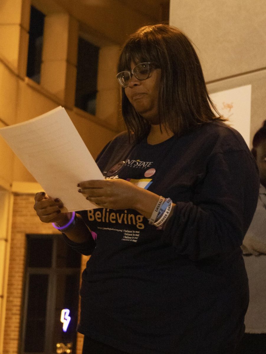 Graduate student intern Autumn Jacobs shares her experiences with sexual violence in her speech at the Tale Back the Night march, Oct. 8, 2024.