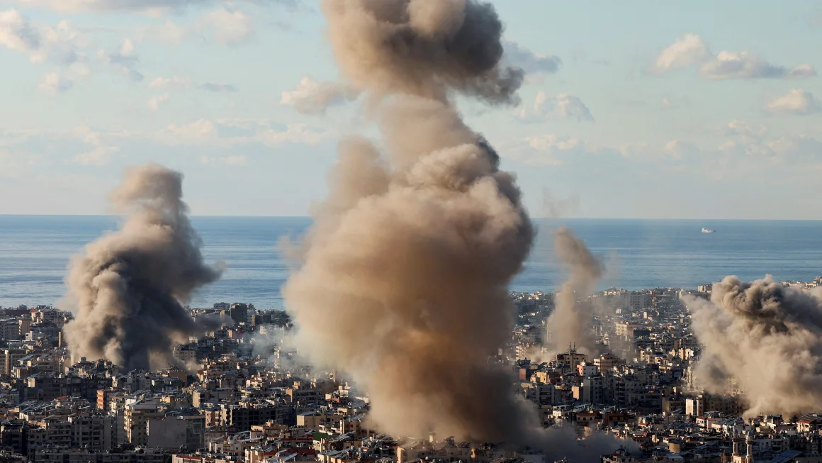 Smoke billows over Beirut's southern suburbs after Israeli strikes on Tuesday. 