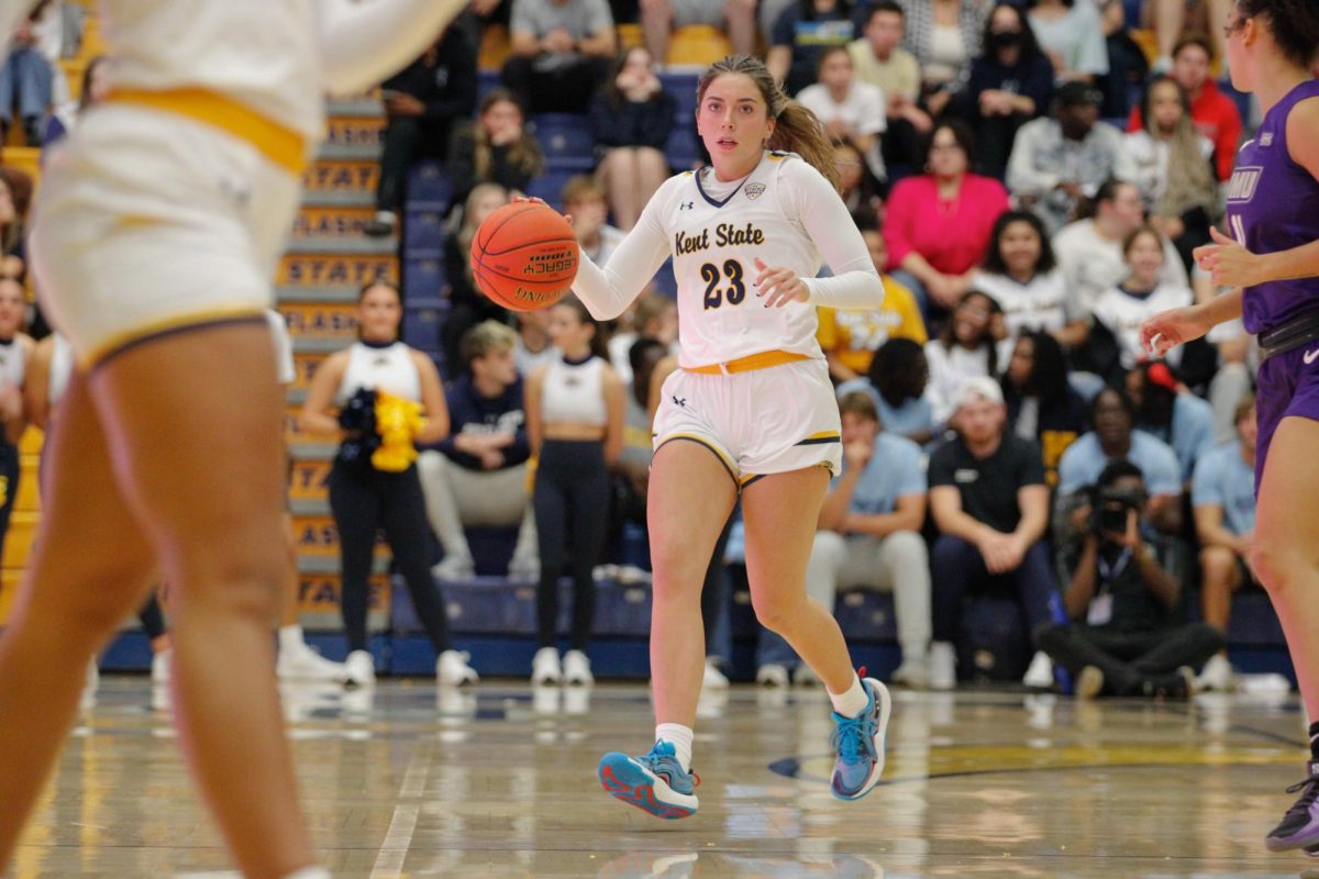 Kent State University sophomore guard Mya Babbitt dribbled the ball down the court against the opponent James Madison University on November 4, 2024 in the MACC. 