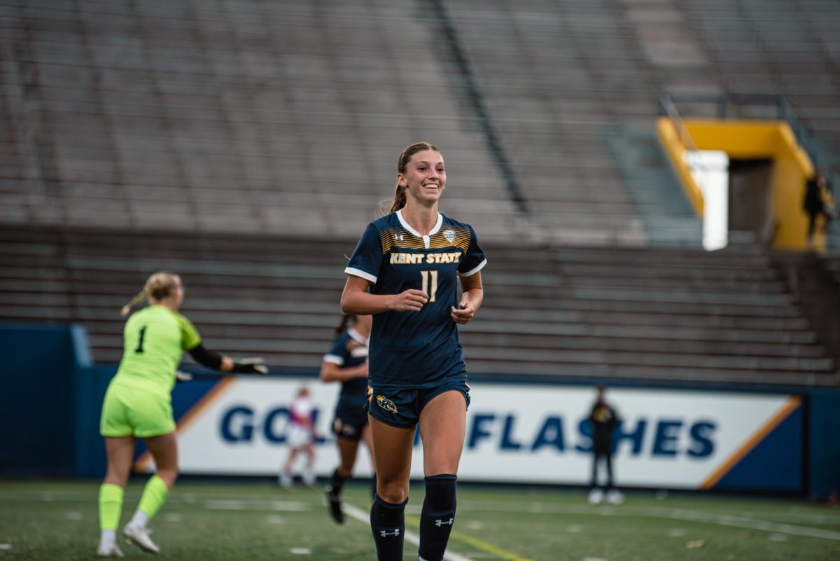 Alisa Arthur Kent State senior and midfielder jogs to meet her team to celebrate her goal against Bowling Green. Oct. 31, 2024.