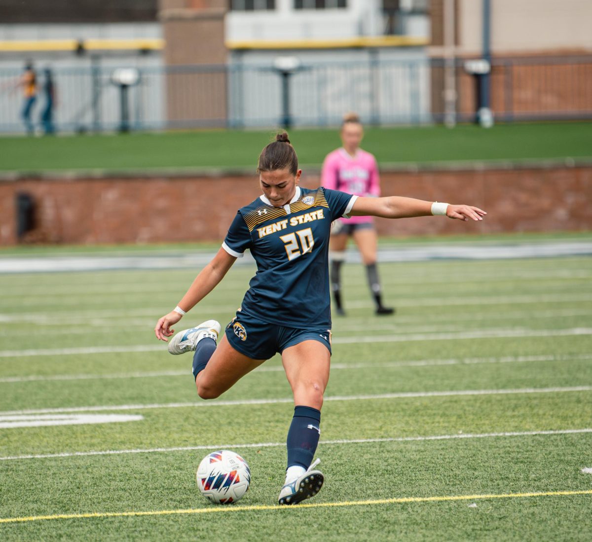 Freshman defender Ali Weibel passes to her teammate at a game against Bowling Green Oct. 31, 2024.