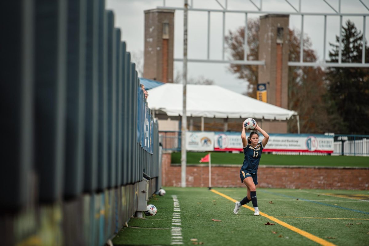 Kent State junior and defender Kelsey Salopek throws ball into play during the first half against Bowling Green. Oct, 31, 2024. 