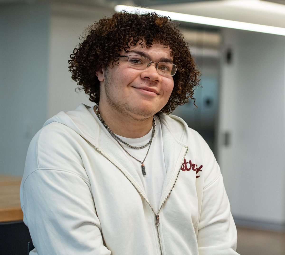 Name Lastname sits for a portrait at the DI Hub, Nov. 6, 2024.