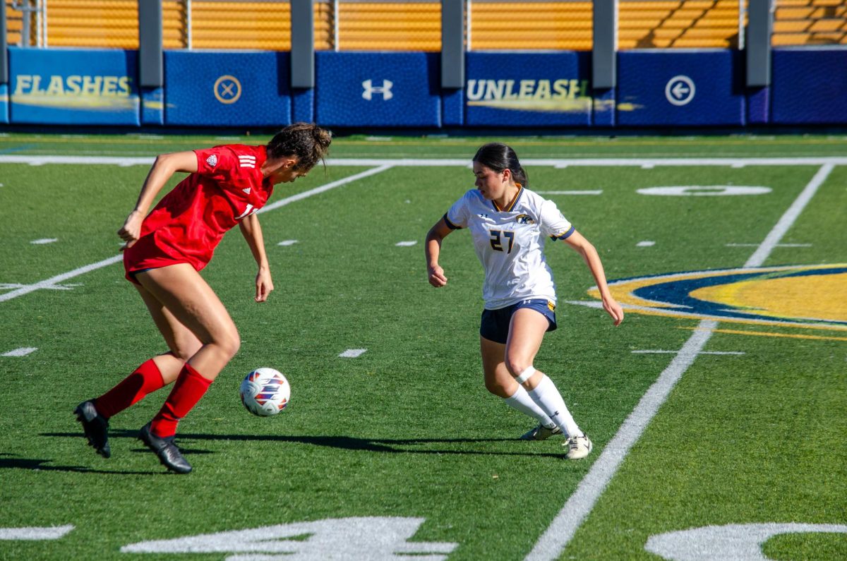 Kent State player Katie Henahan goes face to face for the ball against Miami University player on November 3, 2024, at Dix Stadium. 