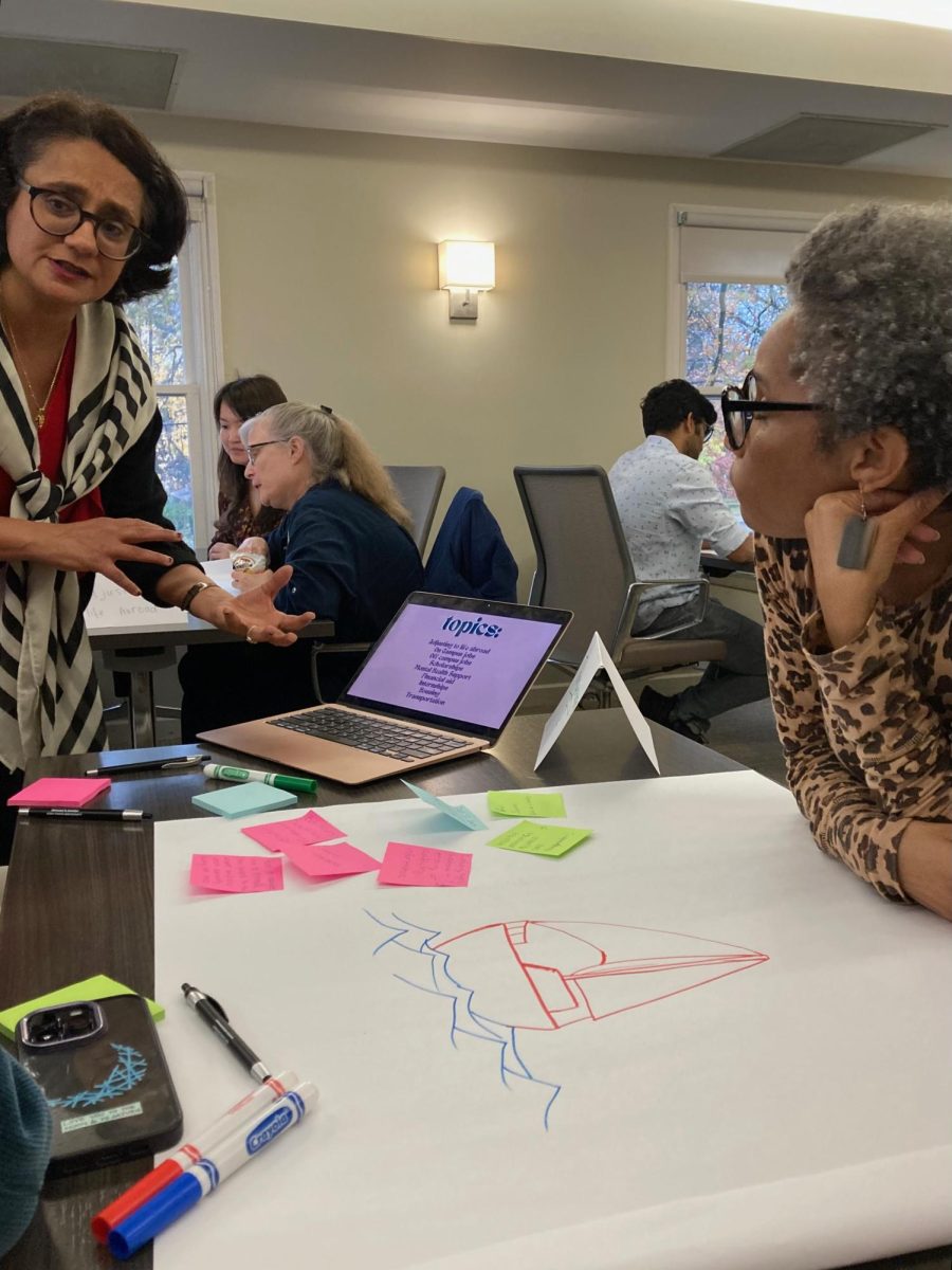 Women's Center program coordinator Sonia Karkare talks with attendees at the "Day in the Life of a Woman International Student" event Nov. 19, 2024. 