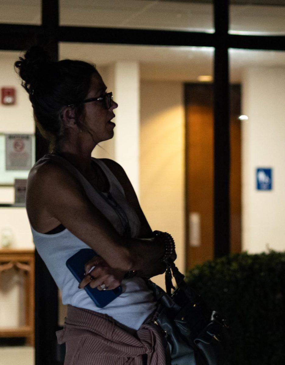 Jessica Billiter, Kent resident, casts their vote at the United Methodist Church of Kent late in the evening on Nov. 5th, 2024.