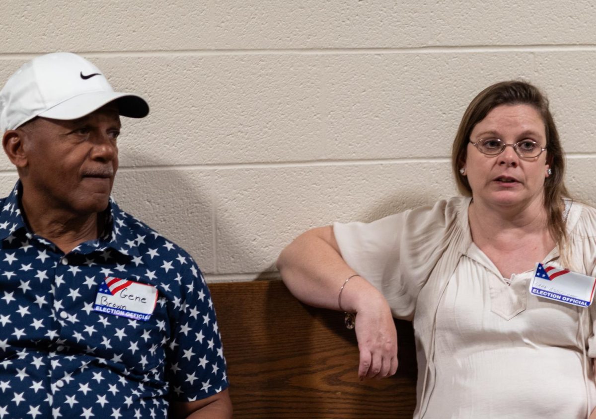 Gene Brown and Sara Ashley-Cook, voting managers at the United Methodist Church of Kent, sit down for an interview after a long day. They say they saw more voters than they had in past elections Nov. 5th, 2024.