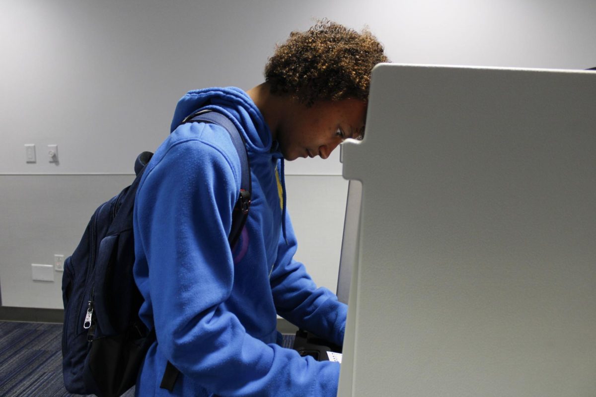 Freshman Najee Morris casted his vote in the presidential election at the Kent State University's Rec and Wellness Center on Nov. 5, 2024. 