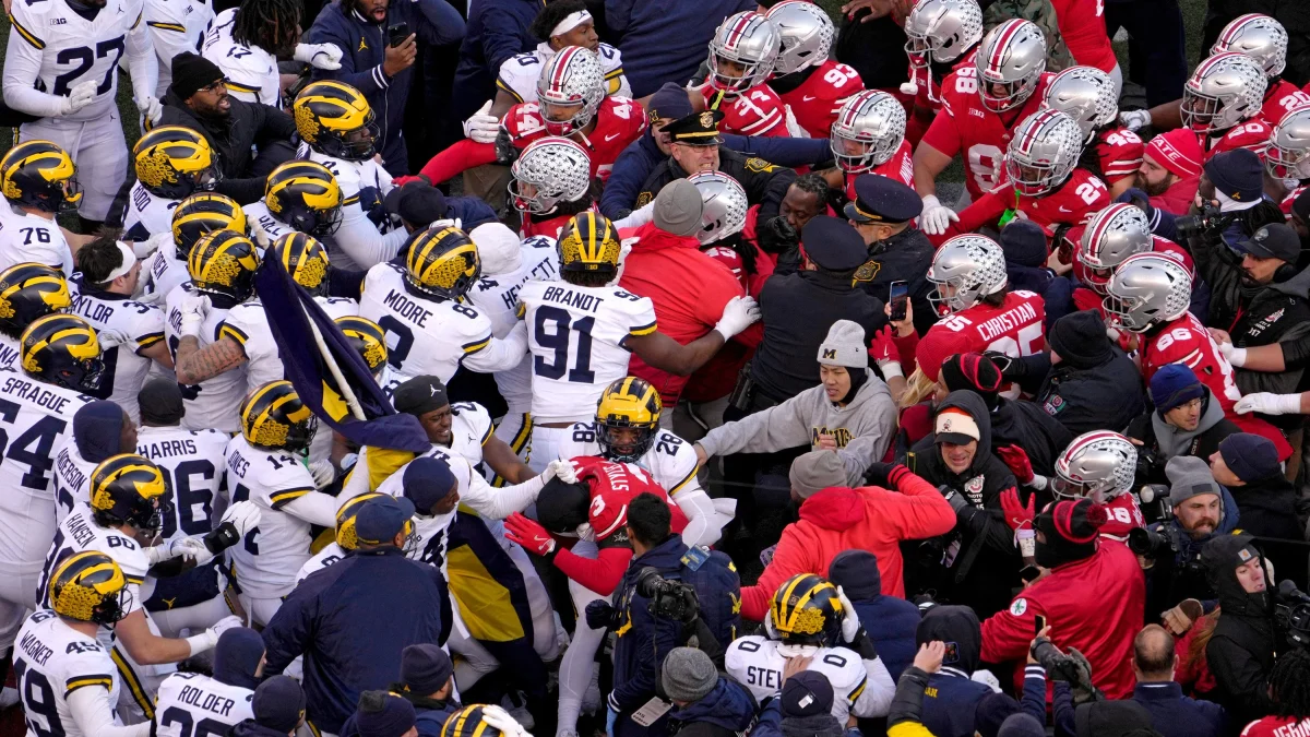 A fight broke out after the game between storied rivals Ohio State and Michigan.